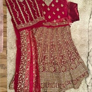 Elegant Red and Gold bridal stone work and thread work dress wedding